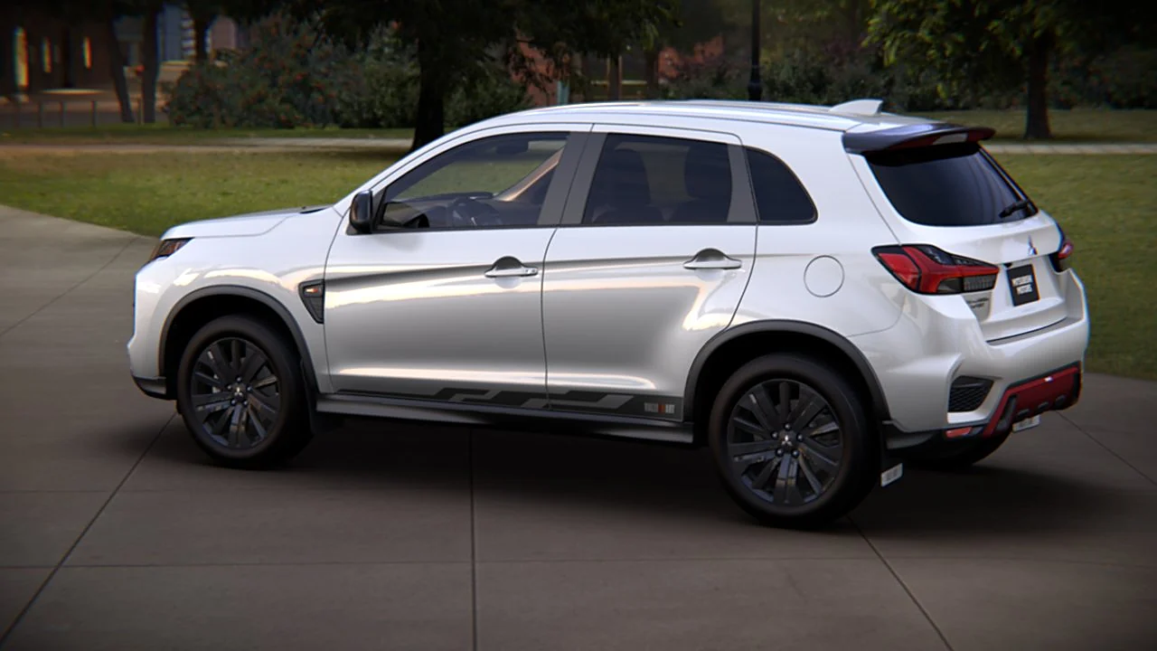 White Mitsubishi Outlander side profile